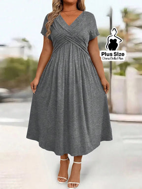 Vestido Midi com Decote V Modelagem Transpassada e Bolsos Laterais Vestido Midi com Decote V Modelagem Transpassada e